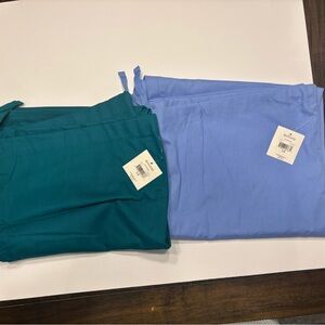 OPP SCRUBS WOMEN SIZE LARGE 2 PAIR PANTS OPP
COLORS:  GREEN PAIR & LILAC PAIR